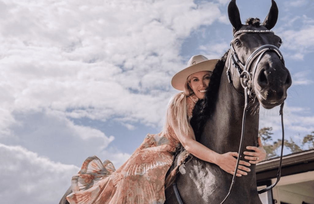 Monique Richter hugging her horse