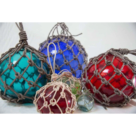 glass floats in different colors to use in DIY garland project