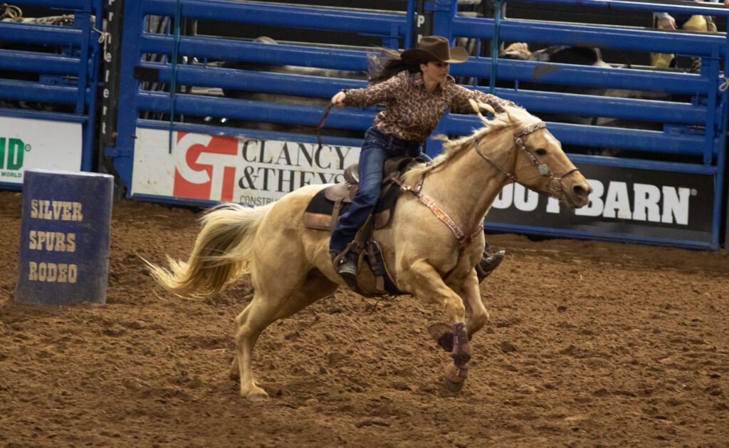 Silver Spurs Rodeo by Bill Pena Barrel Racing