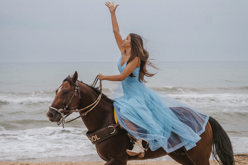 Coastal cowgirl riding a horse | About Saltsy Studio
